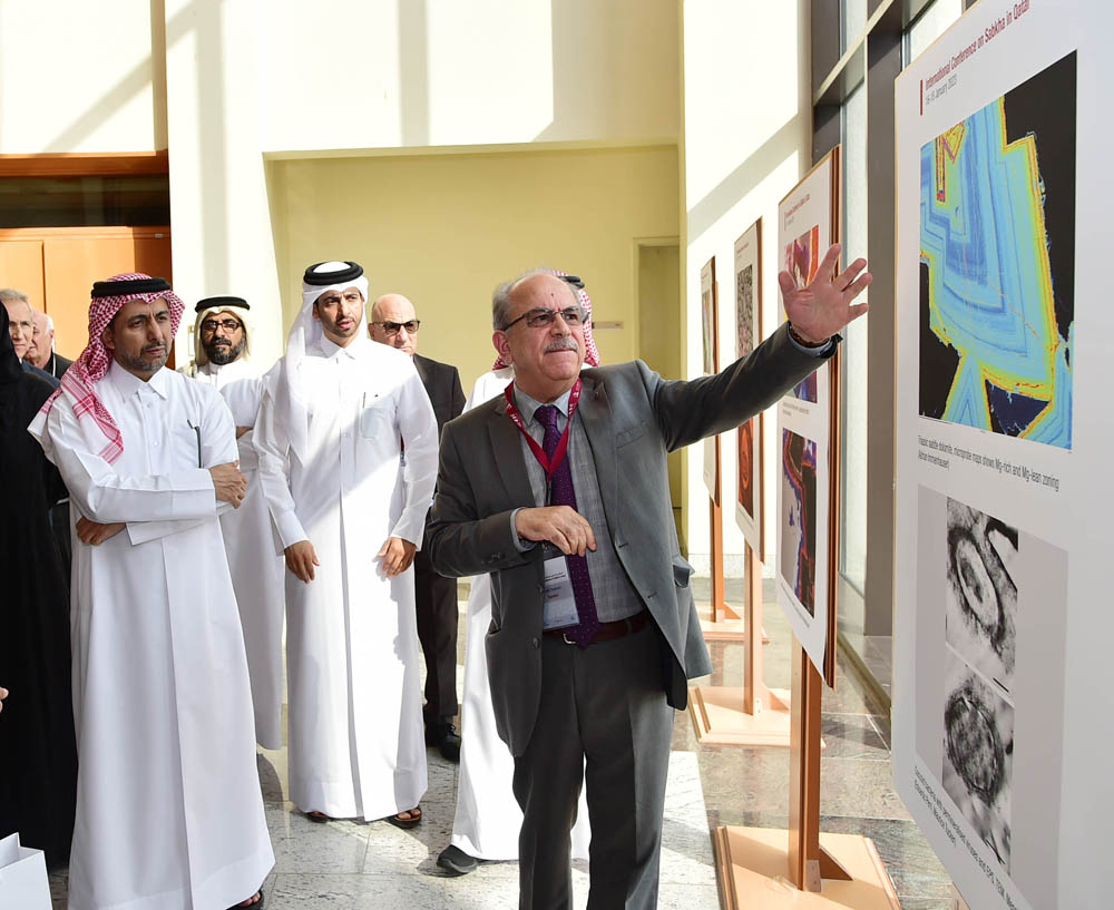 President of Qatar University Dr. Hassan Al Derham views some of the research presentations.