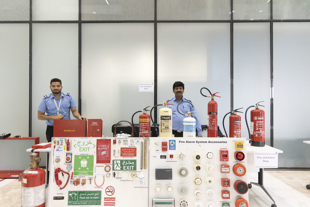 Officials displaying safety equipment during the programme. 