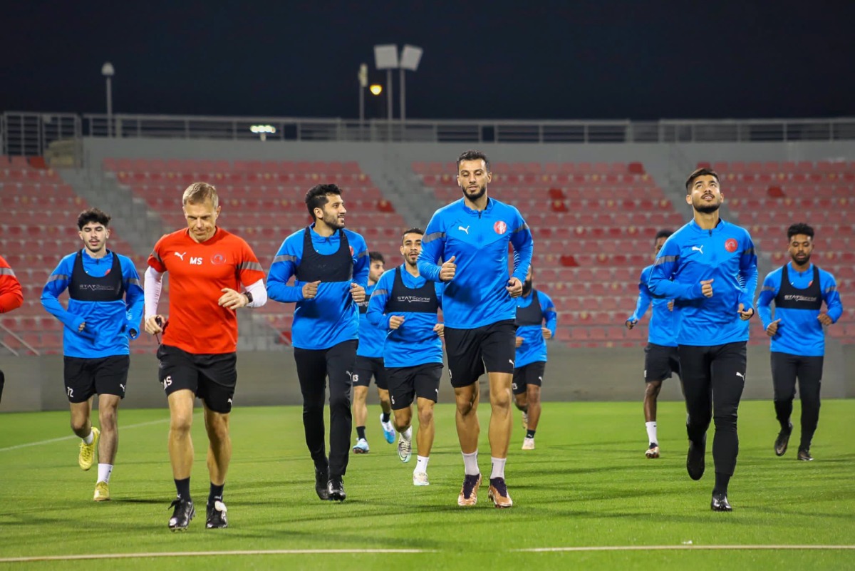 Al Arabi players take part in a training session, yesterday.