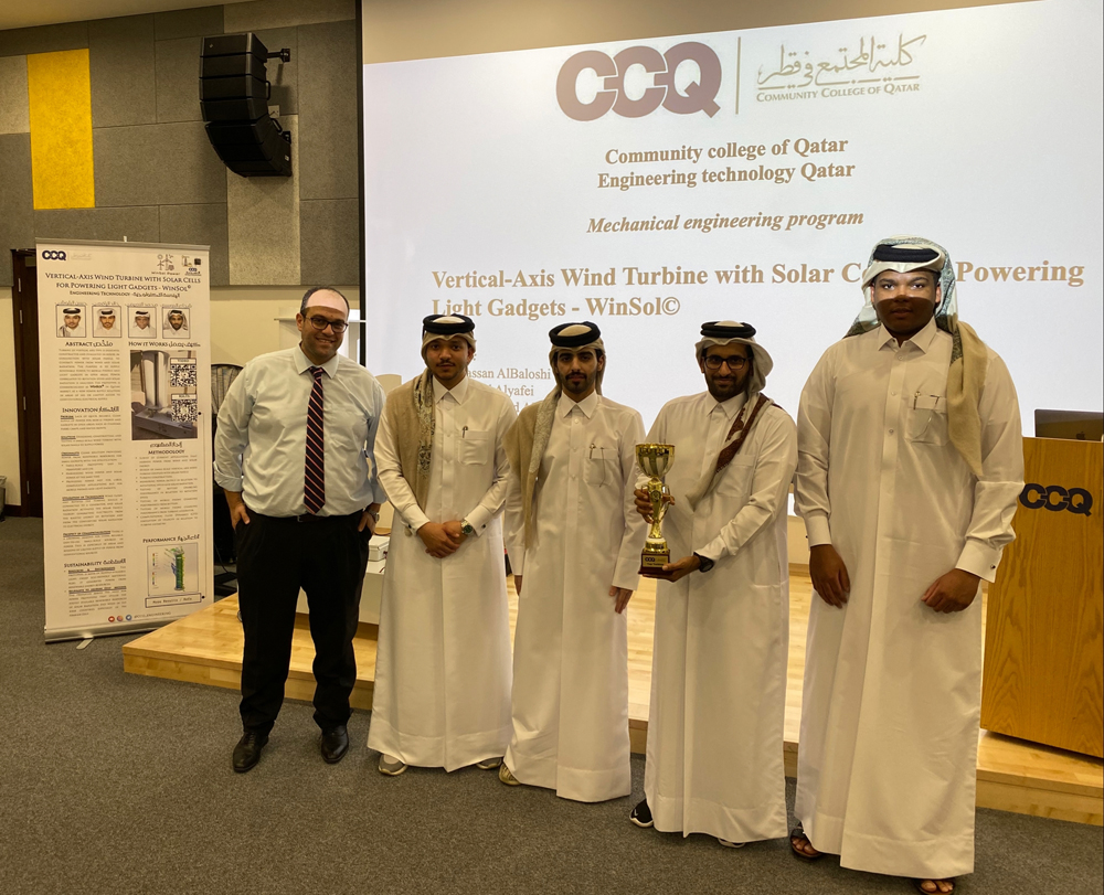 Dr. Faysal Eliyan, Assistant Professor, Engineering Technology Department, at CCQ, with winners of the ‘Top Turbine’ competition. 