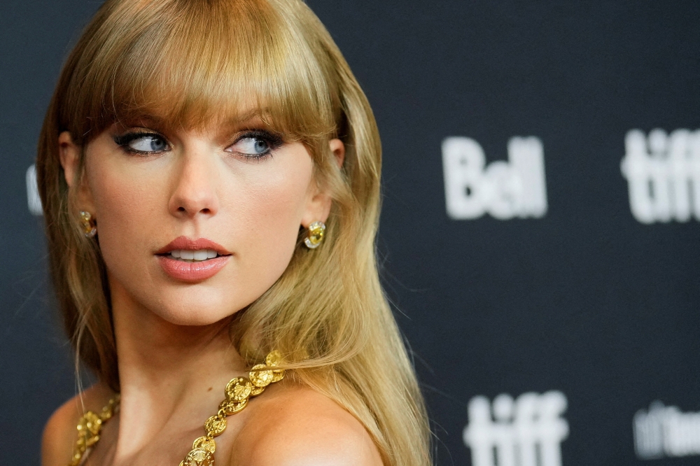 Singer Taylor Swift arrives to speak at the Toronto International Film Festival (TIFF) in Toronto, Ontario, Canada September 9, 2022. REUTERS/Mark Blinch/File Photo

