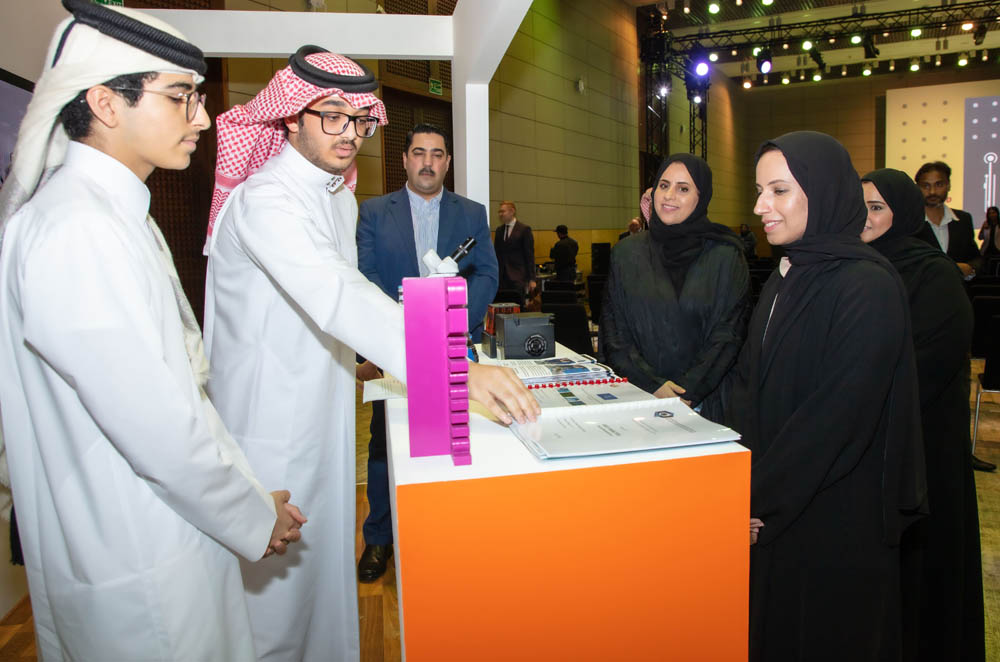 Minister of Education and Higher Education H E Buthaina bint Ali Al Jabr Al Nuaimi touring a pavilion of Qatar Spotlight winning projects.