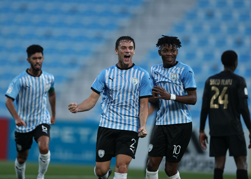 Al Wakrah’s Lucas Mendes (left) celebrates with Gelson Dala. PIC: Amr Diab  