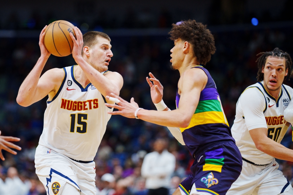 Jan 24, 2023; New Orleans, Louisiana, USA; Denver Nuggets center Nikola Jokic (15) fights for position against New Orleans Pelicans center Jaxson Hayes (10) during the first quarter at Smoothie King Center. Mandatory Credit: Andrew Wevers-USA TODAY Sports