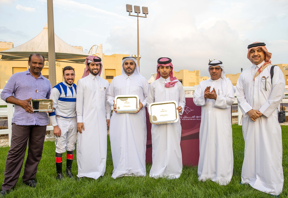 The connection of Wukair with Qatar Racing and Equestrian Club’s Racing Manager, Abdulla Rashid Al Kubaisi after Nasser Saeed Al Eida’s six-year-old bay horse won the Ras Rokn Island Cup during the ninth Al Uqda Meeting, yesterday. PICTURES: Juhaim/QREC