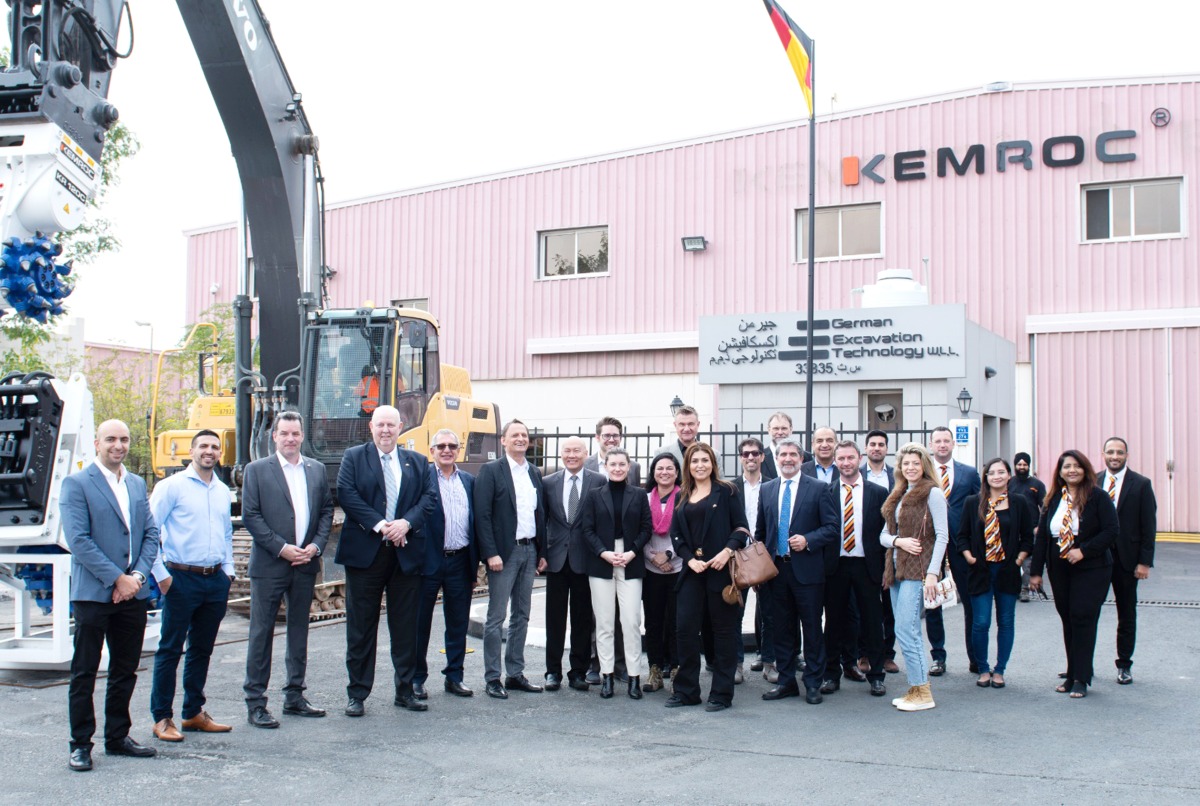 Chancellor Jörg Fürstenau, board members of GBCQ, German Industry and Commerce Office (AHK Qatar), Qatar Free Zone Authority, Invest Qatar officials and reporters pose for a photograph after the factory tour.