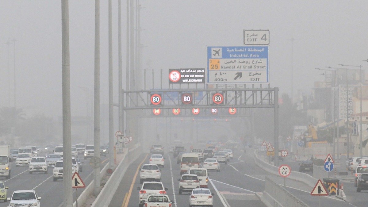 Movement of vehicles on a Doha street in the evening, as visibility is reduced, on February 1, 2023.  Photo by Salim Matramkot / The Peninsula
