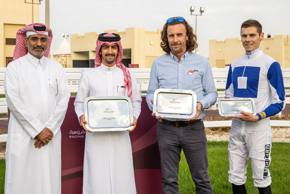 The feature winners at QREC's 13th Al Uqda Meeting were honoured by Al Uqda Complex Manager Abdulaziz Jassim Al Boenain. PICS: Juhaim/QREC

