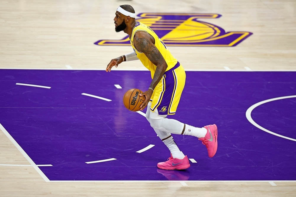 LeBron James #6 of the Los Angeles Lakers handles the ball during the first half of a game against the Oklahoma City Thunder at Crypto.com Arena on February 07, 2023 in Los Angeles, California. Ronald Martinez/Getty Images/AFP