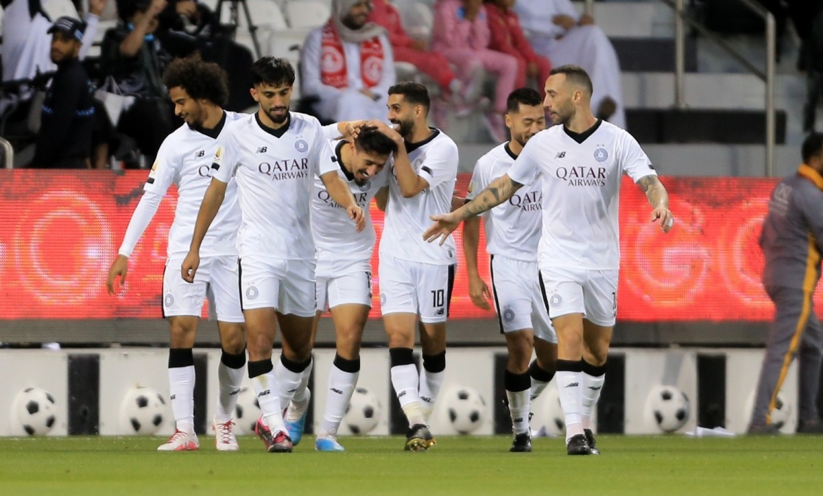 Al Sadd's players celebrate after Baghdad Bounedjah scored their second goal against Al Arabi, on Thursday.