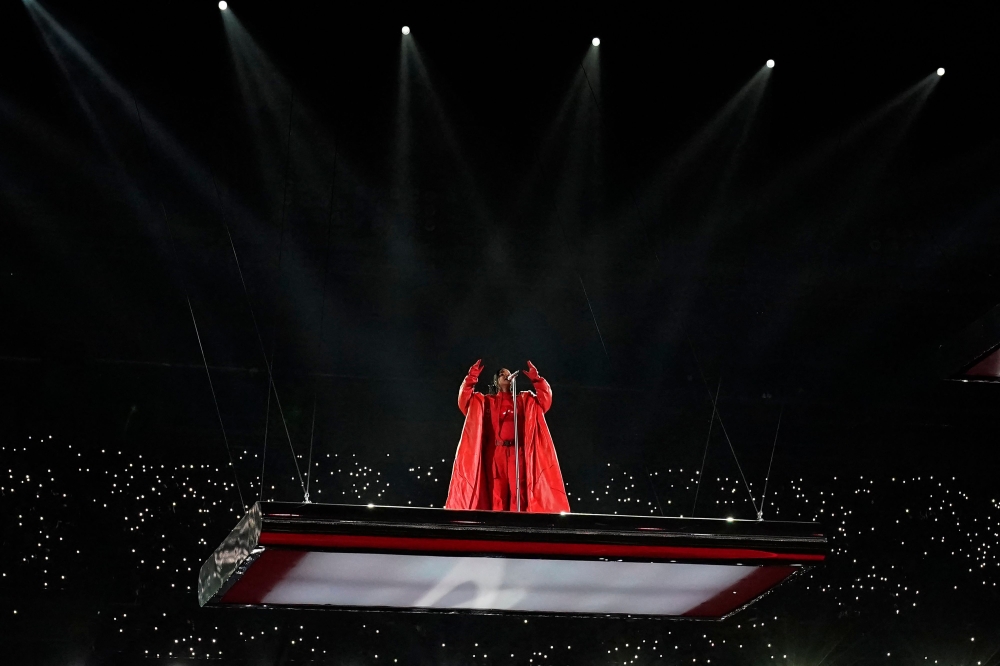 Barbadian singer Rihanna performs during the halftime show of Super Bowl LVII between the Kansas City Chiefs and the Philadelphia Eagles at State Farm Stadium in Glendale, Arizona, on February 12, 2023. (Photo by TIMOTHY A. CLARY / AFP)