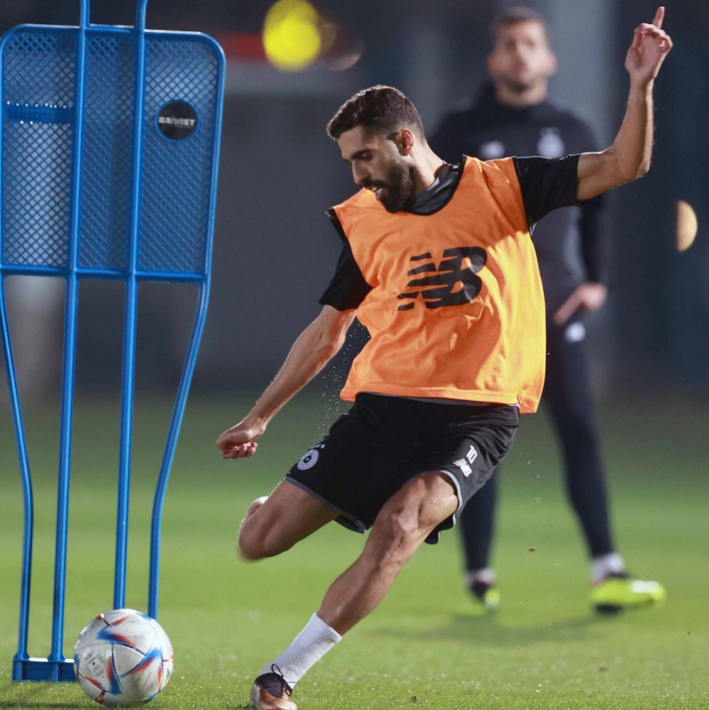 Al Sadd's Hassan Al Haydos kicks the ball.