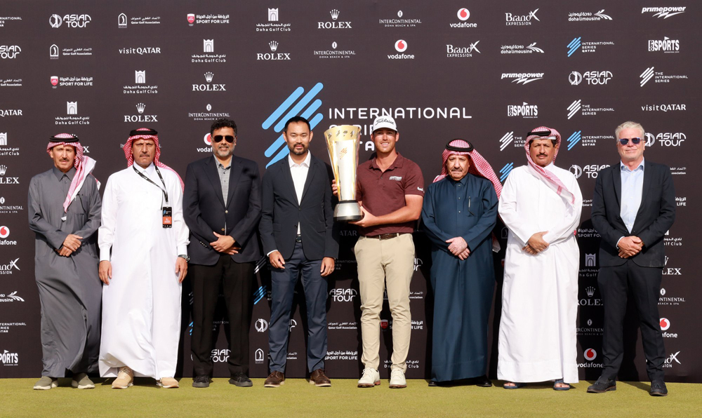 International Series Qatar winner Andrew Ogletree poses with the trophy along with Qatar Golf Association (QGA) President Hassan Nasser Al Naimi, Asian Tour CEO Cho Minn Thant, QGA General Secretary Fahad Al Naimi and other officials during the presentation ceremony at the Doha Golf Club, yesterday.