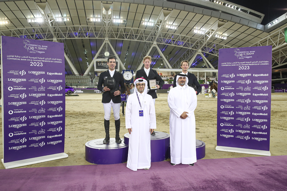 The podium winners of CSI 5*1.50m Marcus Ehning (centre),  Francisco Jose Mesquita Musa (left) and Kevin Staut pose with the officials. PICTURES: CHI Al Shaqab
