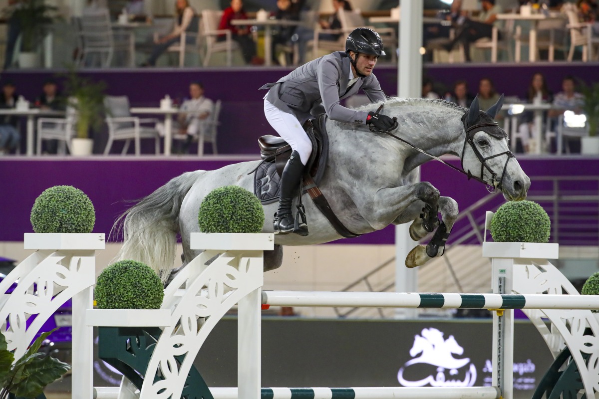 Christian Kukuk and grey stallion Mumbai in action at Longines Outdoor Arena at Al Shaqab yesterday. PICS: CHI Al Shaqab   