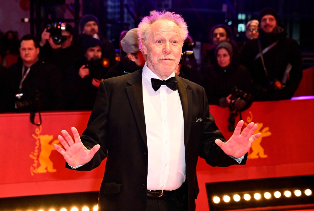 French director Nicolas Philibert poses on the red carpet as he arrives to attend the award ceremony of the 73rd Berlin International Film Festival in Berlin, on February 25, 2023. (Photo by Tobias SCHWARZ / AFP)