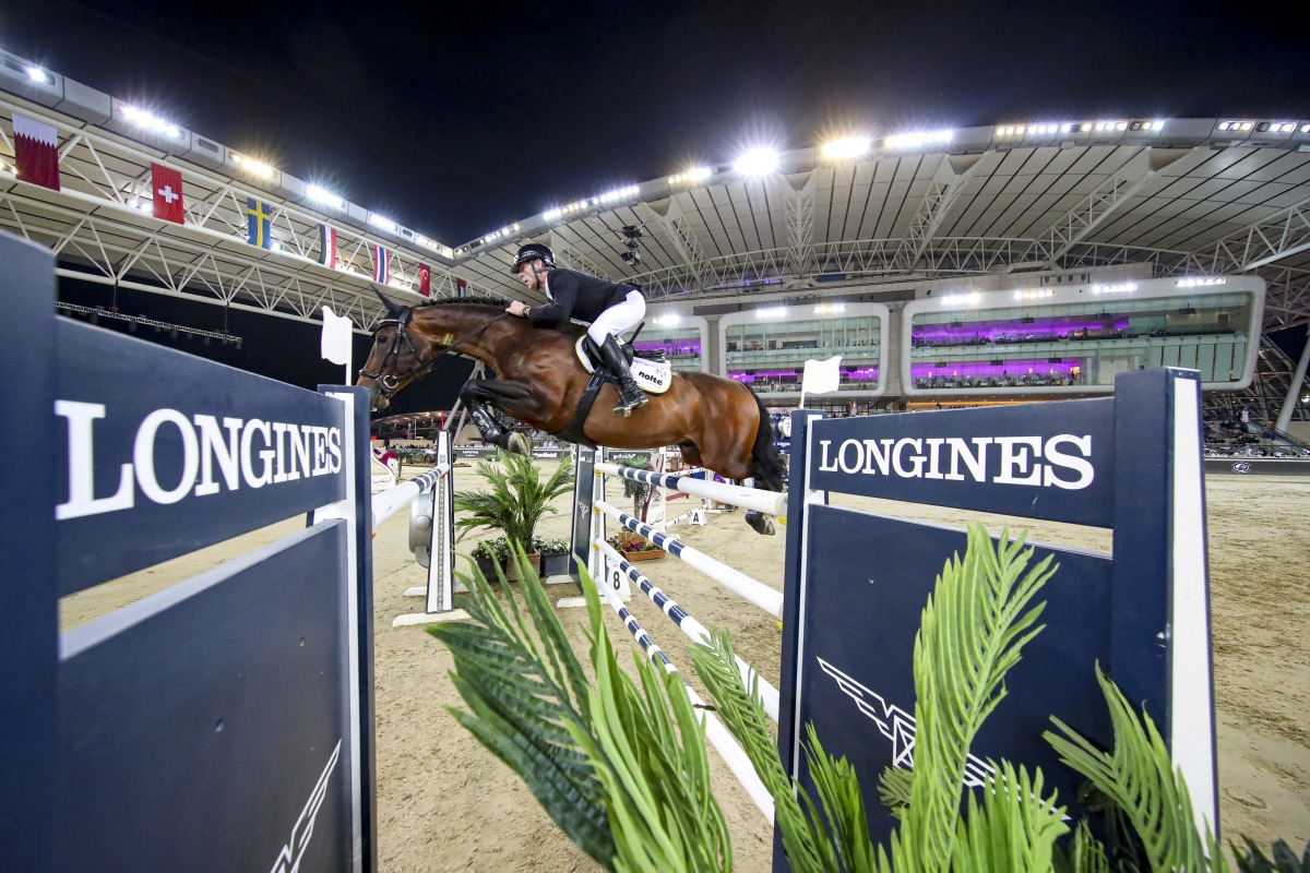 Germany’s Marcus Ehning guides Stargold over an obstacle during the Commercial Bank CHI Al Shaqab Grand Prix presented by Longines, yesterday.