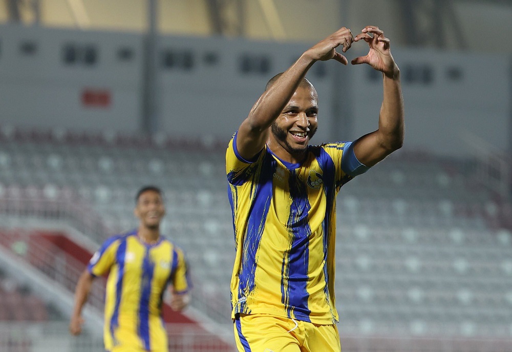 Al Gharafa's Yacine Brahimi celebrates after scoring a goal. 