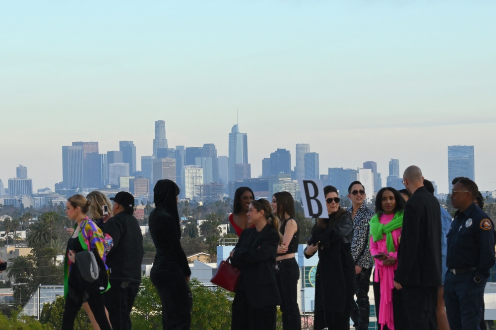 Guests attend the Versace Fall/Winter 2023 fashion show in West Hollywood, California, on March 9, 2023. (Photo by ANGELA WEISS / AFP)