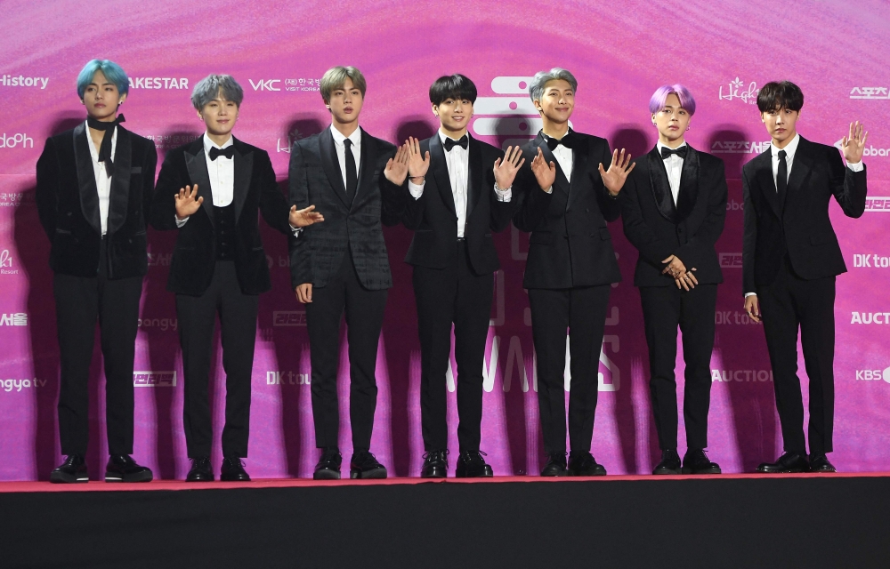 In this file photo taken on January 15, 2019, South Korean boy band BTS, also known as the Bangtan Boys, pose on the red carpet at the 28th Seoul Music Awards in Seoul. Photo by Jung Yeon-je / AFP