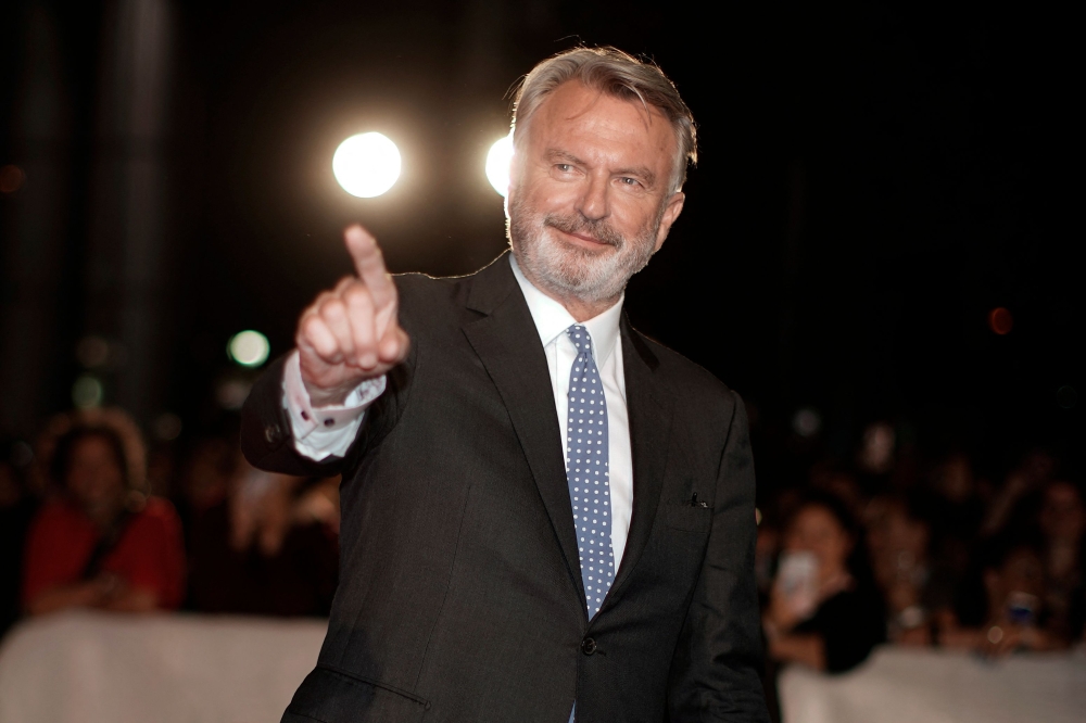 (FILES) In this file photo taken on September 6, 2019 actor Sam Neill arrives for the premiere of 