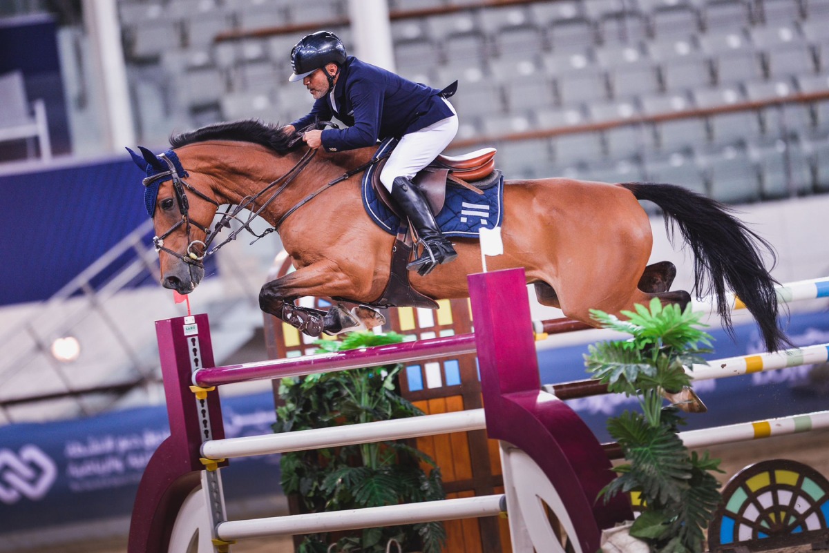 Ramzy Al Duhami astride High Quality J clears an obstacle during the Big Tour.  