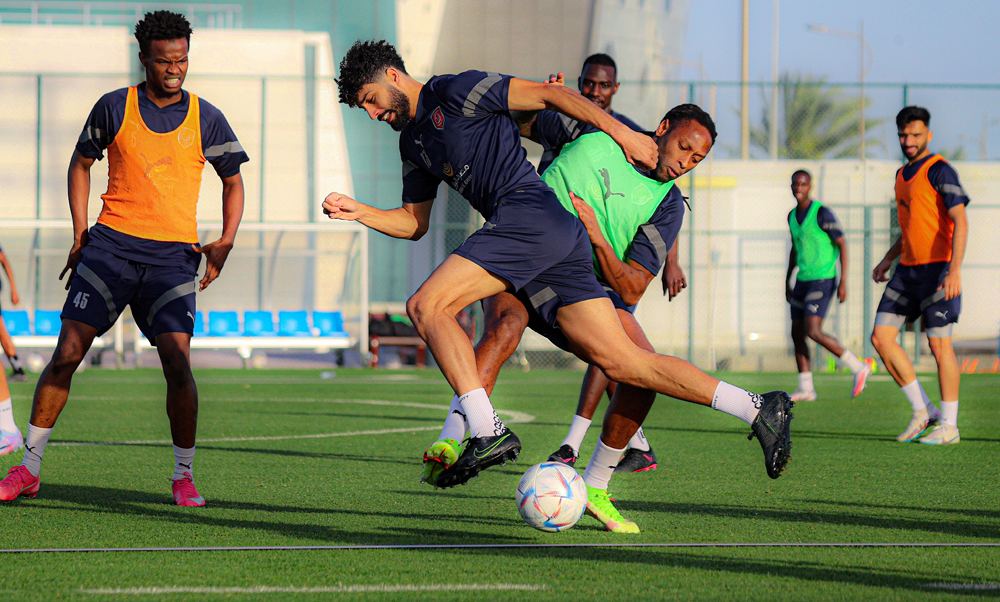 Al Duhail players in action during a training session, yesterday.