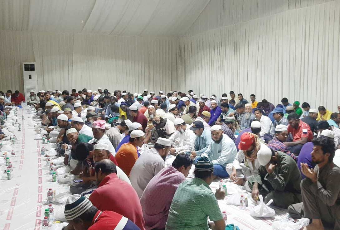 People gather at a tent hosted by the Qatar Red Crescent Society (QRCS) for iftar yesterday.