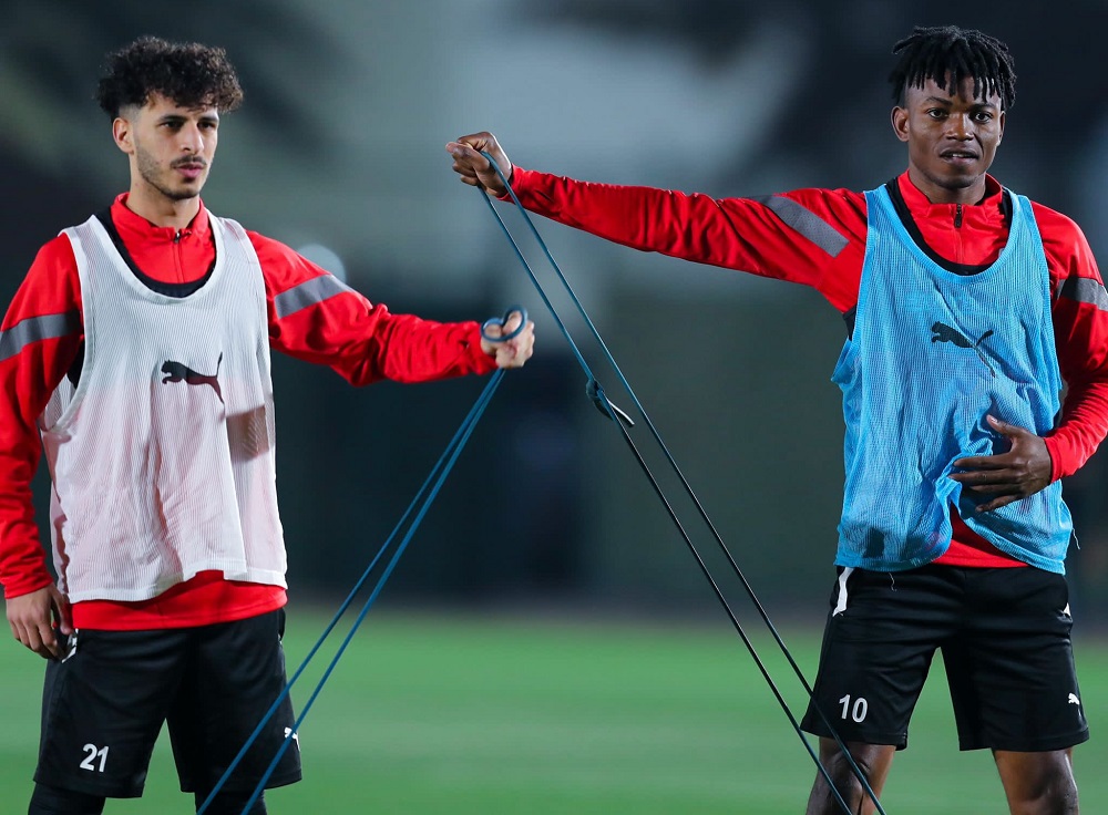 Al Wakrah's Jacinto Dala (right) with a team-mate during a training session.   