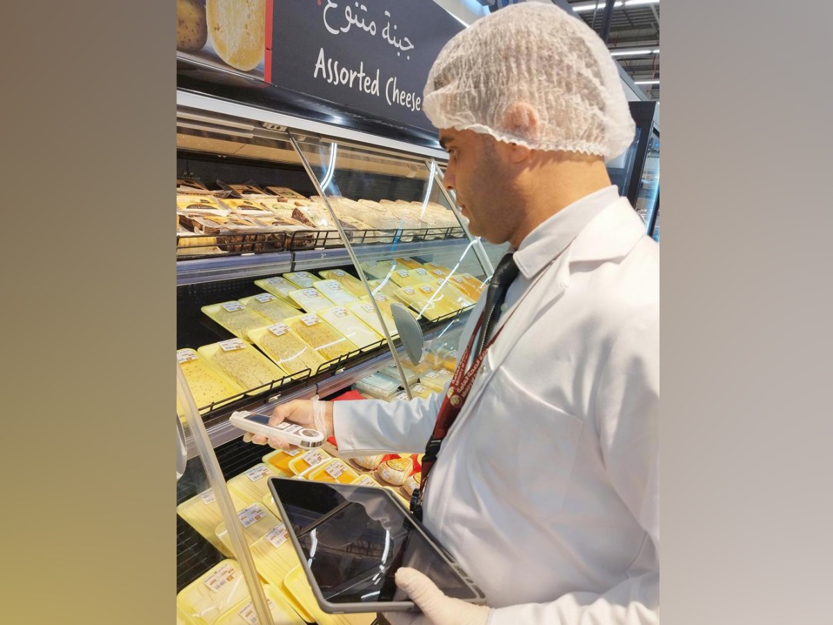 MInistry official inspecting the quality at a supermarket 