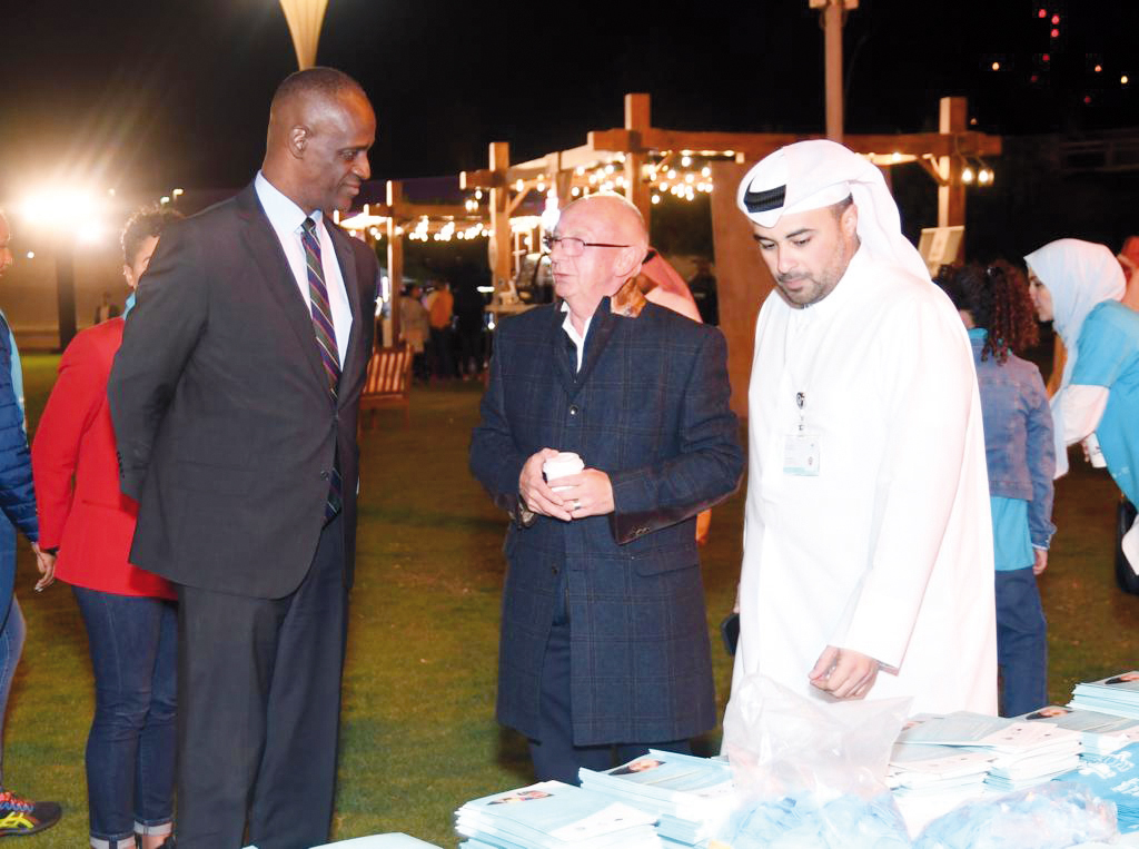 US Ambassador H E Timmy T Davis; Executive Director of Special Schools and Special Educational Needs Services, QF, Mark Hughes; and Khalid Kassab, Public Relations Officer, Pre-University Education at Qatar Foundation during World Autism Awareness Day activities held yesterday.  
