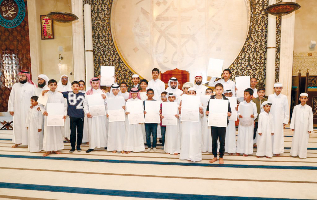 Officials with winners of the competition at the Katara mosque. 