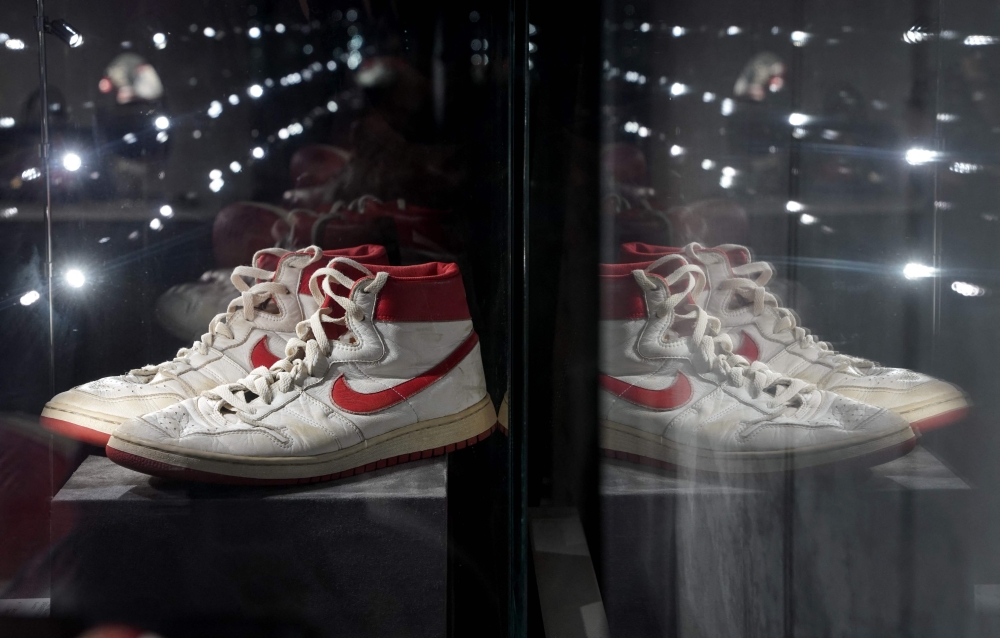 In this file photo taken on July 24, 2020, the Air Ship, MJ Player Exclusive, Game-Worn Sneaker Nike, 1984, is displayed during a press preview at Christie's New York. Photo by TIMOTHY A. CLARY / AFP