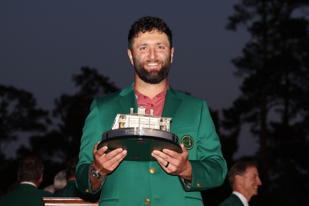 Jon Rahm of Spain poses with the Masters trophy during the Green Jacket Ceremony after winning the 2023 Masters Tournament at Augusta National Golf Club on April 09, 2023 in Augusta, Georgia. Christian Petersen/Getty Images/AFP 