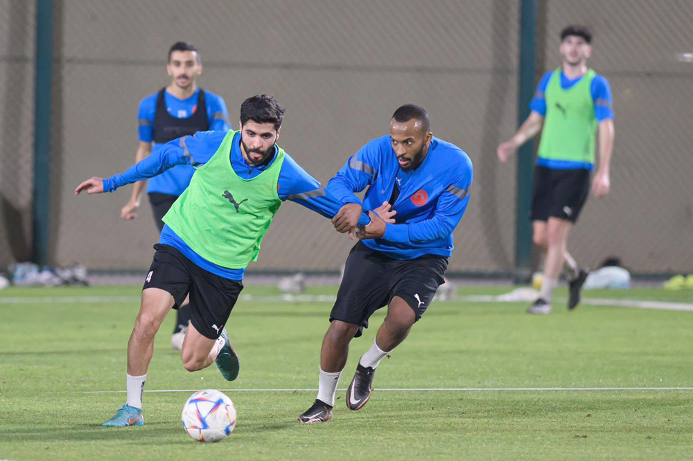 Al Arabi players attend a training session.