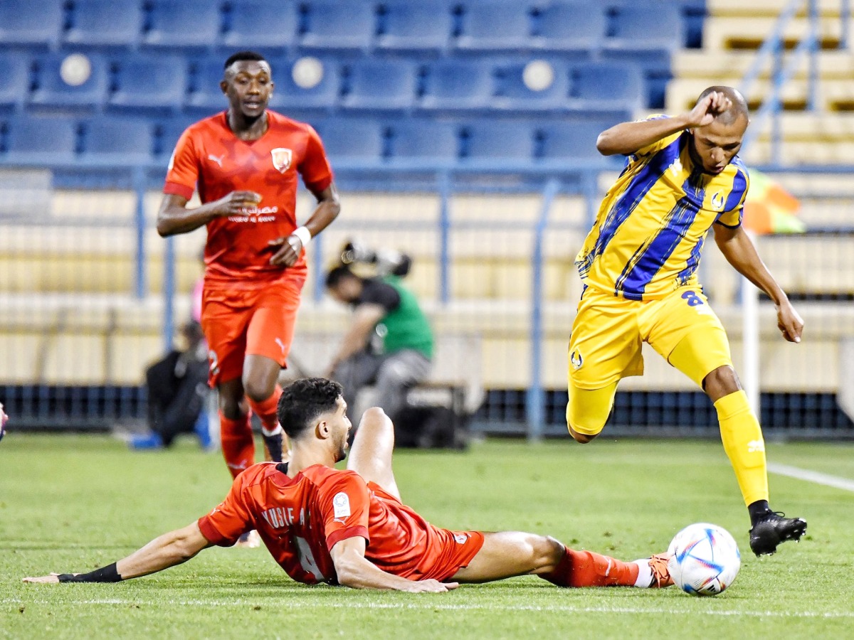 Al Gharafa's Yacine Brahimi (right) in action during match against Al Duhail.