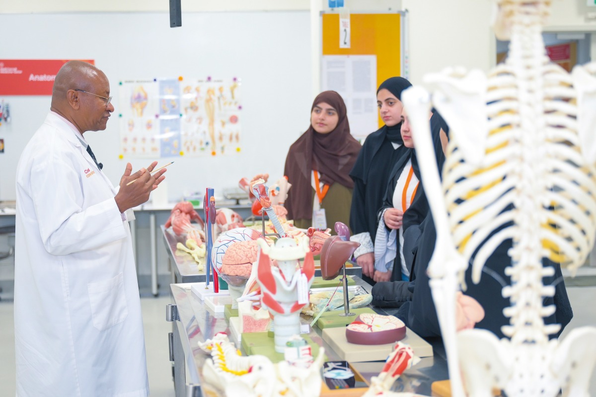 Dr. Avelin Malyango, assistant professor of anatomy in radiology, speaking to students. 