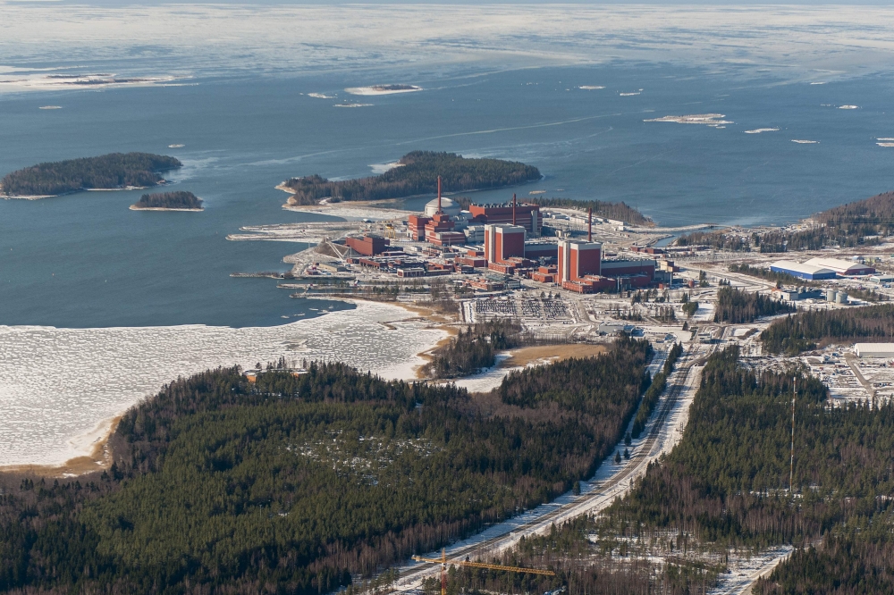 In this file handout photo taken on March 10, 2021 made available by Finnish electricity operator TVO shows an aerial view of the nuclear power plant in Olkiluoto, Finland. (Photo by Tapani Karjanlahti / TVO / AFP) 