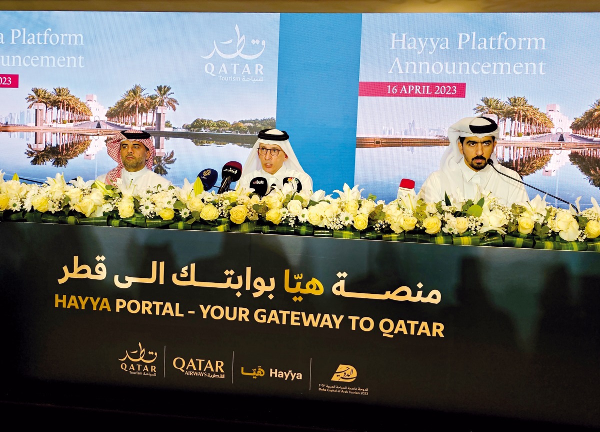 Qatar Airways Group Chief Executive and Qatar Tourism Chairman H E Akbar Al Baker (centre), Hamad International Airport Chief Operating Officer Eng. Badr Mohammed Al Meer (left), and Hayya Platform CEO Saeed Ali Al Kuwari during the Hayya Portal press conference at HIA yesterday. Pic: Marivie Alabanza/The Peninsula