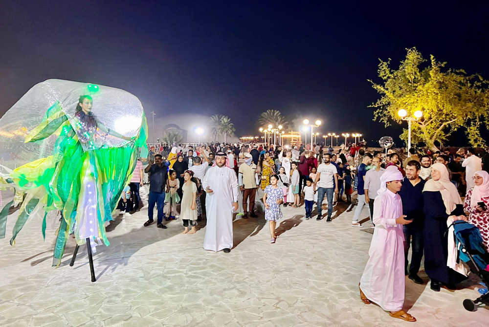 A stilt walker dressed as a fun character performs at Souq Al Wakra as part of the Eid Festival. PIC: Ahmed Barakat