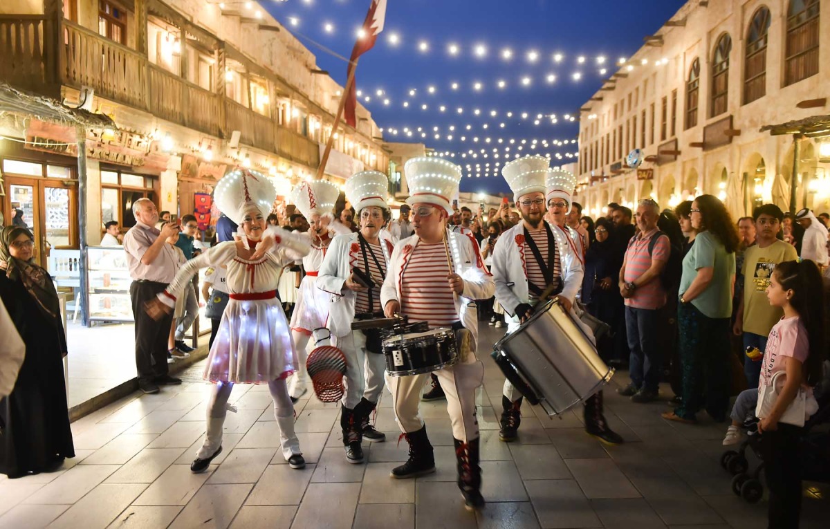 Crowd witnessing street performers during Souq Waqif Eid Festival yesterday. PIC: Abdul Basit