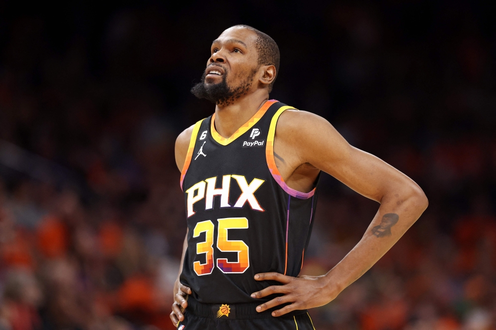 In this file photo taken on April 25, 2023 Kevin Durant #35 of the Phoenix Suns reacts during the second quarter against the LA Clippers in game five of the Western Conference First Round Playoffs at Footprint Center in Phoenix, Arizona. (Photo by Christian Petersen / Getty Images / AFP)