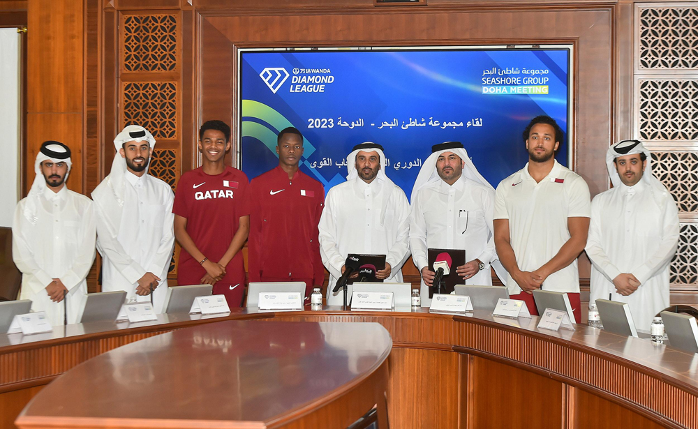 Qatar Athletics Federation (QAF) President and Chairman of Doha Diamond League Organising Committee Mohammed Issa Al Fadala poses for a photograph with other QAF officials and Qatar athletes following a press conference held at the Qatar Olympic Committee Headquarters, yesterday. Pic: Abdul Basit