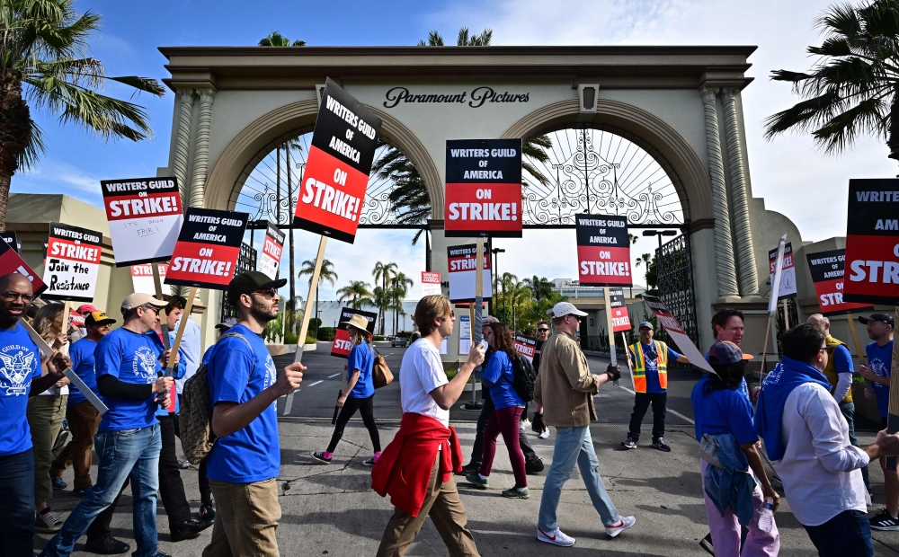 Writers walk the picket line on the second day of the television and movie writers' strike outside of Paramount Studios in Los Angeles, California on May 3, 2023. Photo by Frederic J. BROWN / AFP