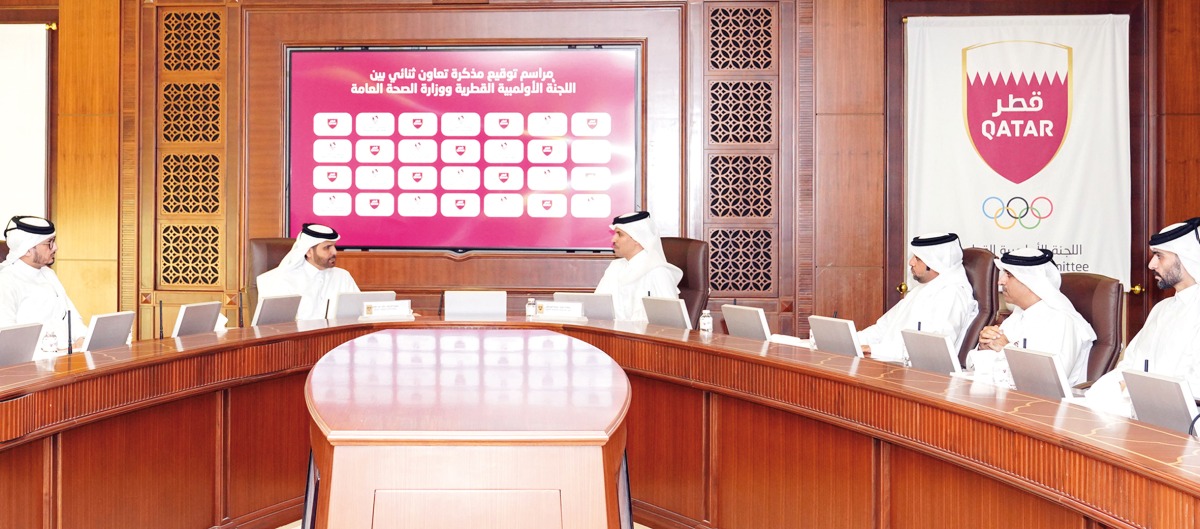 Assistant Minister for Health Affairs, Dr. Saleh Ali Al Marri (second left); QOC Secretary General, Jassim bin Rashid Al Buenain (fourth right); and other officials during the MoU signing.    