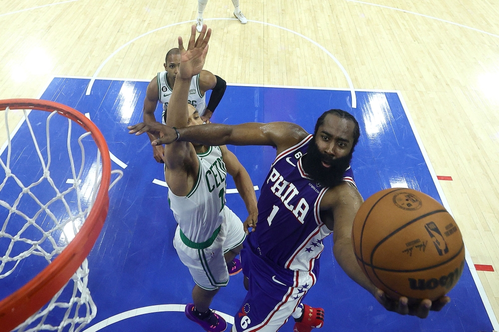 James Harden #1 of the Philadelphia 76ers shoots the ball against Malcolm Brogdon #13 of the Boston Celtics during the third quarter in game four of the Eastern Conference Second Round Playoffs at Wells Fargo Center on May 07, 2023 in Philadelphia, Pennsylvania. Photo by Tim Nwachukwu / AFP)
