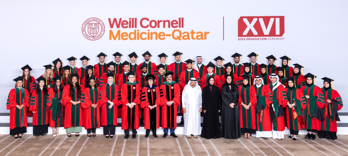 Minister of Education and Higher Education H E  Buthaina bint Ali Al Nuaimi, Chairman of Al Faisal Holding H E Sheikh Faisal bin Qassim Al Thani, and Dean of WCM-Q Dr. Javaid Sheikh pose with the graduates.