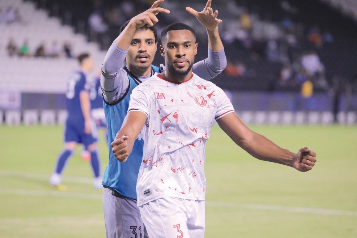 Loick Landre (right) celebrates with a teammate after scoring Al Shamal's winning goal yesterday.