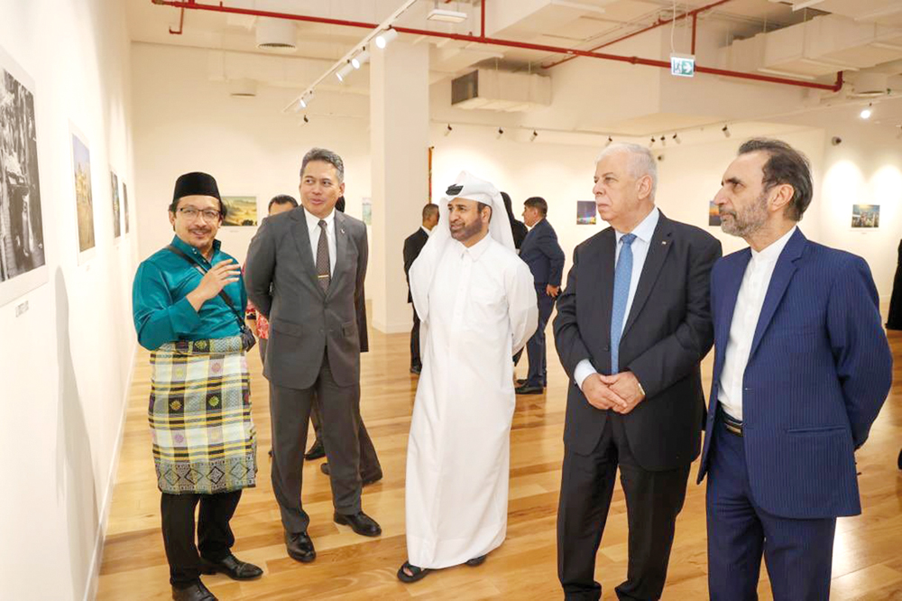 Katara General-Manager Prof Dr. Ibrahim Al Sulaiti (third right), Ambassador of Malaysia to Qatar H E Zamshari Shaharan (2nd left), with other officials during the opening of the exhibition.