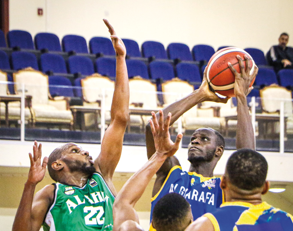 Al Ahli and Al Gharafa players in action during their Qatar Basketball League match, in this file photo.